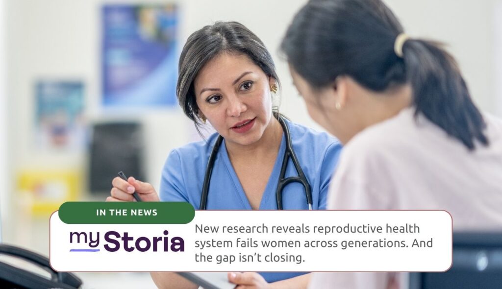 Female doctor talking and showing report to a female patient