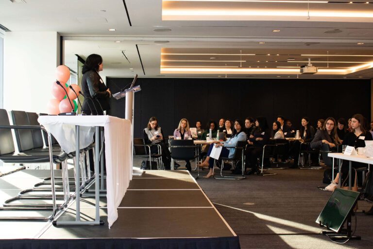 Rachel Bartholomew oh Hyivy speaking to a group of individuals at the 2024 Femtech Canada Launch event in Toronto